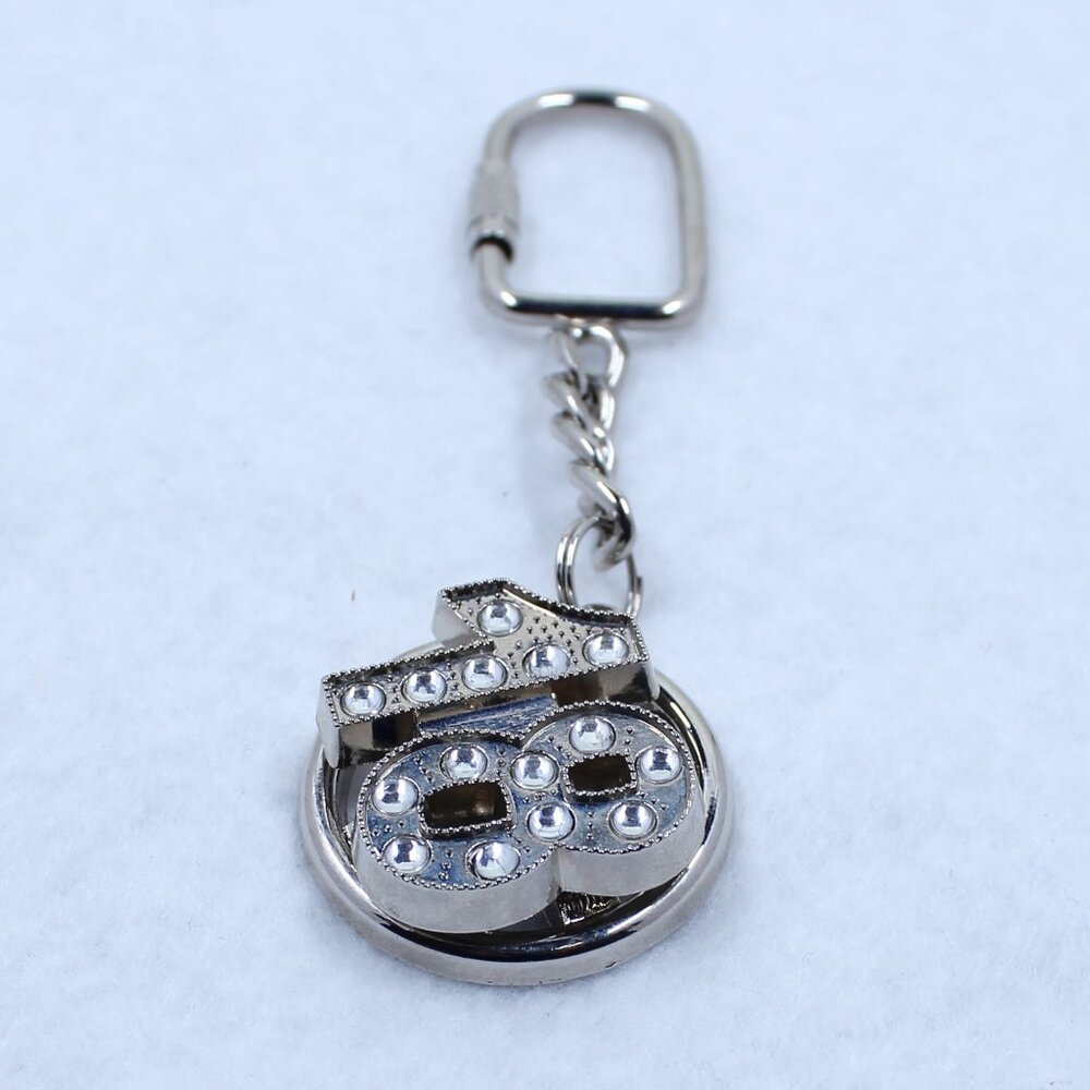 Silver Tone Keychain With Spinning Number 18 And Rhinestones